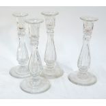 A set of four Brierley glass candlesticks, 24.