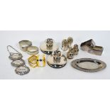 A Danish Sterling napkin ring, a pair of modern design short candlesticks with composite bases, .