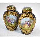 A pair of 19th century Sevres ovoid vases and covers, gros bleu ground,