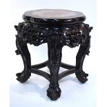 An antique Chinese wood stand with circular marble, or other stone,