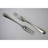 A Victorian pair of heavy quality Britannia standard Hanoverian pattern 3-tine table forks,