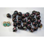 A row of black Venetian beads decorated with polychrome roses etc to/w a turquoise and pearl set