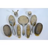 Various silver-backed hairbrushes, hand-mirror,