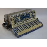 An ornate Scandalli Vibrante Three blue and cream marbled piano accordion,