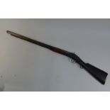 A 19th century percussion lock sporting gun with 76 cm Damascus barrel, wooden ramrod,