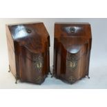 A pair of George III figured mahogany silver mounted knife boxes of serpentine form,