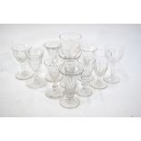 Eleven drinking glasses, various designs; the tallest 14cm high,