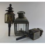 A pair of japanned metal coach-lamps with bevelled glass (converted to electricity),