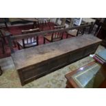 An 18th/19th century oak box settle - a chorister's bench,