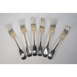 A matched set of six silver fiddle pattern table forks, London 1813/15/31/32,