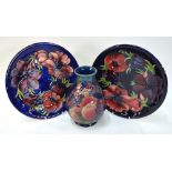 Two Moorcroft chargers decorated with th