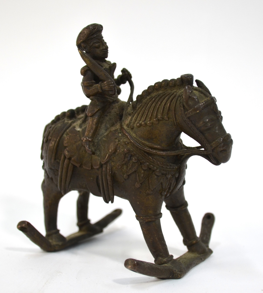 An Indian metal figure of a horseman, ho