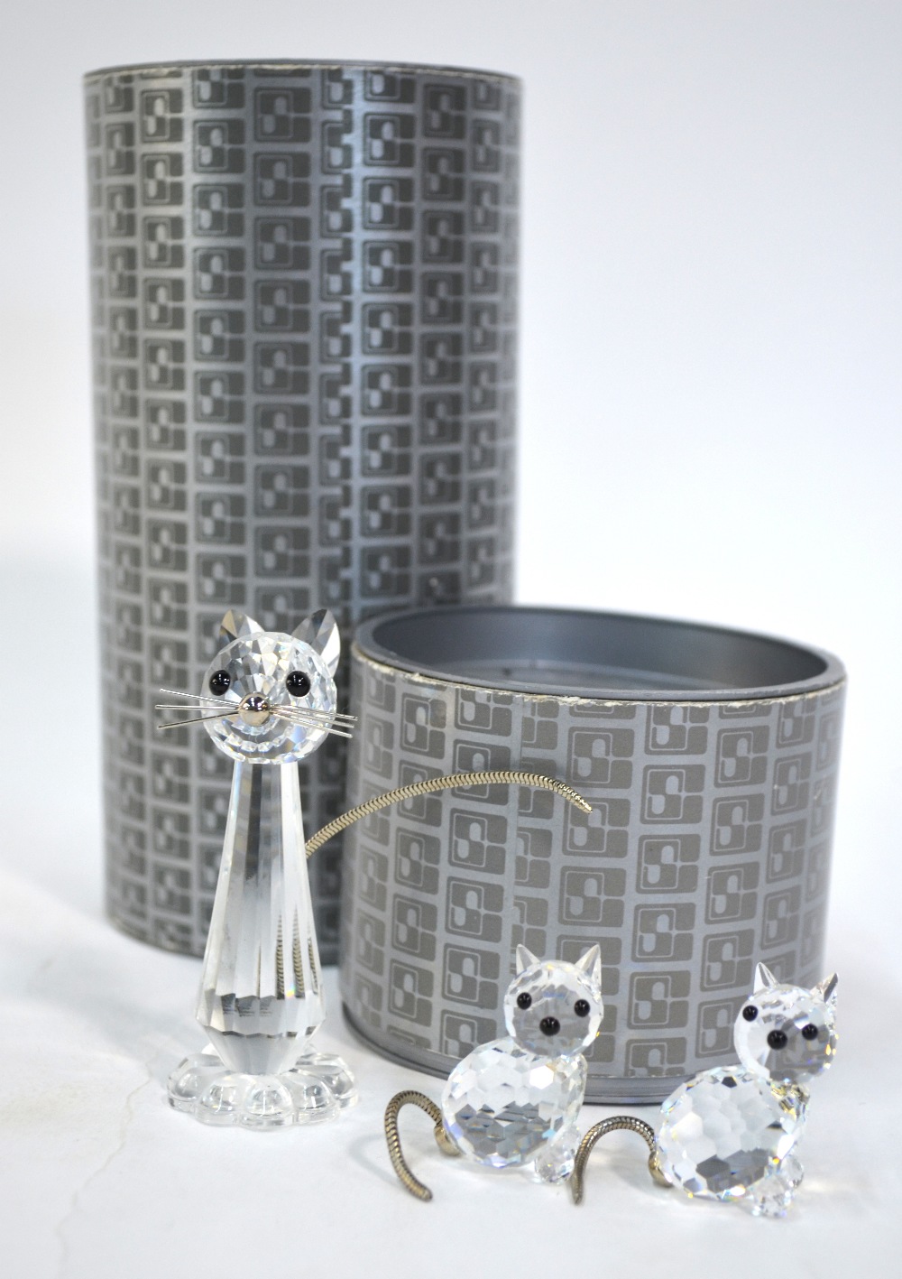 Three Swarovski Crystal cats with metal