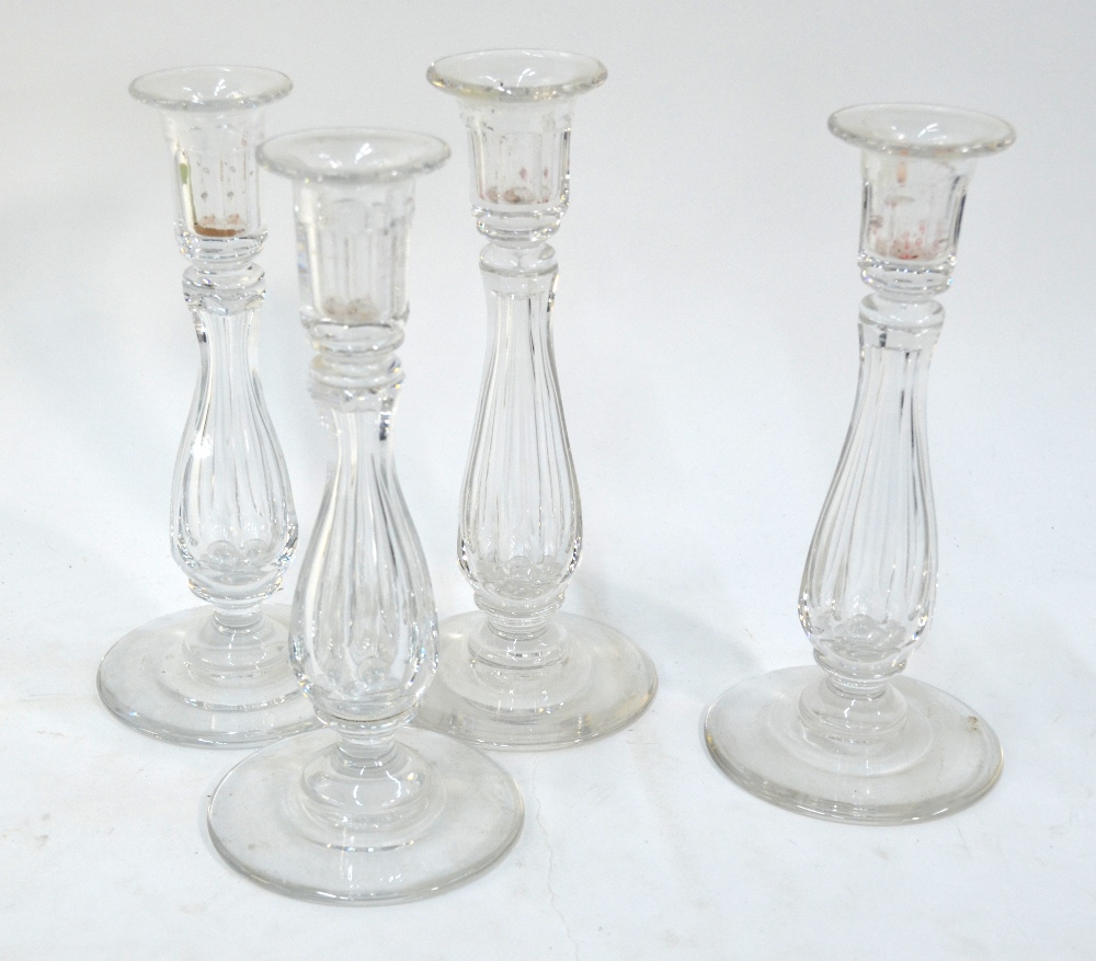 A set of four Brierley glass candlestick
