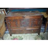 An 18th century oak coffer,