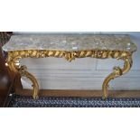 An 18th century and later carved giltwood console table,