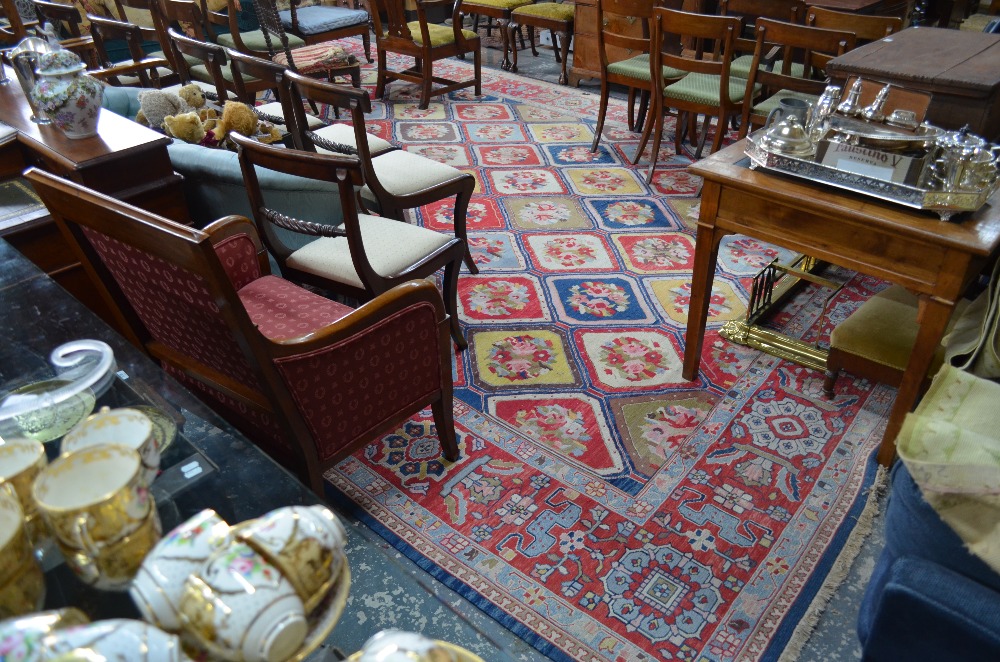 A large decorative handmade rectangular carpet of Baktiari design incorporating geometric tiles
