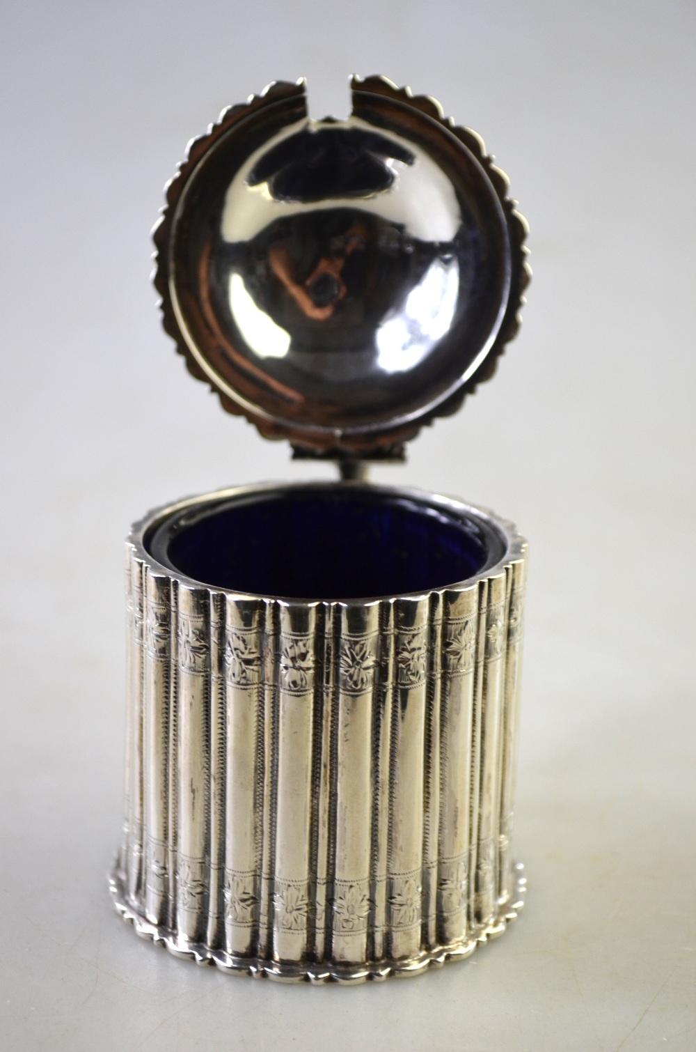 A Victorian silver mustard of reeded drum form with domed cover, beaded handle and blue glass liner, - Image 2 of 5