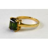 A 9ct yellow gold ring set rectangular green tourmaline,