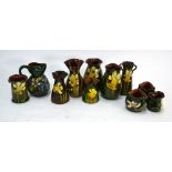 A collection of ten Devon Ware small vases, including Watcombe and Longpark,