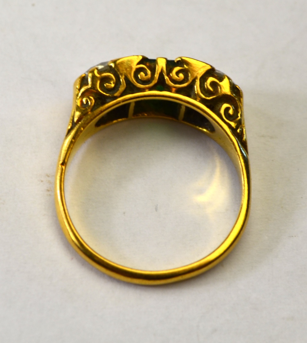 An emerald and diamond three stone ring, 18ct yellow gold carved setting, - Image 4 of 4