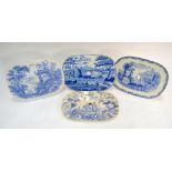 Four 19th century Staffordshire blue and white transfer decorated oval drainers,