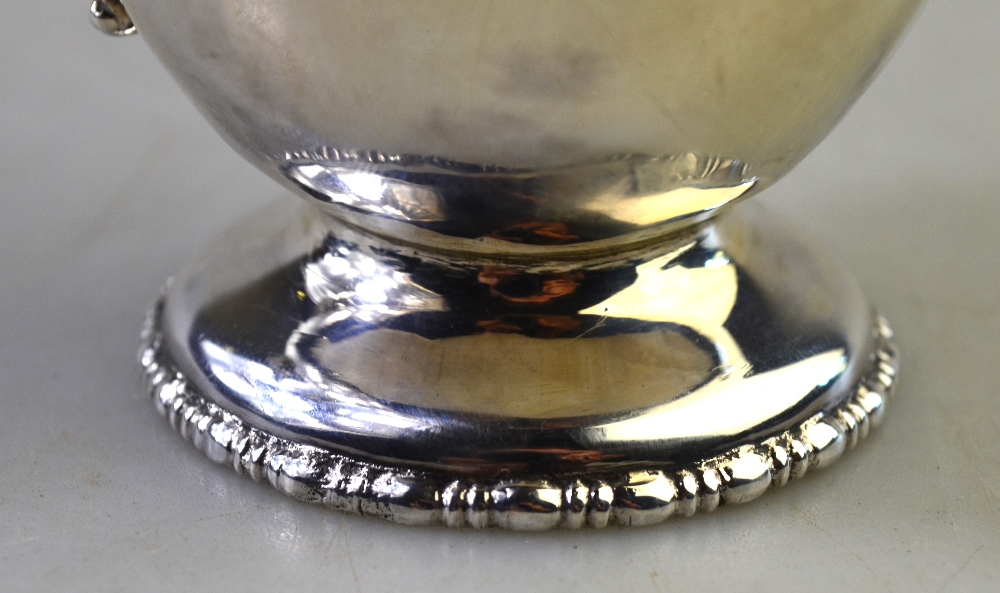 A silver Christening mug of ovoid form, on raised beaded foot, London 1939, 3 oz, - Image 3 of 6