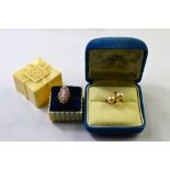 Marquise shaped ring with sardonyx cameo of female playing lyre having small pearls around in