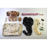 A collection of vintage jewellery including two row cultured pearl necklace, pink paste necklace,