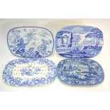 Four Staffordshire blue and white meat drainers;