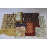 A collection of mostly silk vintage scarves to include; fine wool 'Liberty' example,