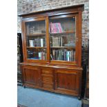 A good quality two part Italian cherrywood library bookcase, contemporary,