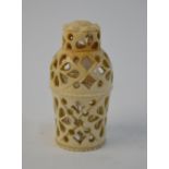 A miniature cut glass scent bottle and stopper, in turned and pierced bone outer case,