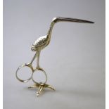 A pair of George III silver ribbon-threaders in the form of a stork on claw foot, William Eley,