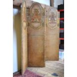 A continental four fold embossed and polychrome decorated arched screen, circa 1900,