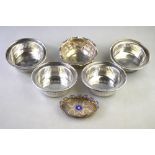 A Continental low grade white metal oval miniature filigree tray with enamel decoration,