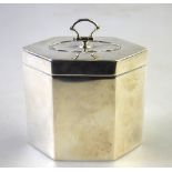 An Edwardian silver Adam revival tea caddy of elongated hexagonal form,