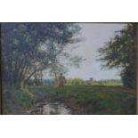 F Tattergrain (1852-1915) - Figure in a landscape beside a river, oil on canvas, signed lower right,