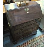 A small George III mahogany bureau,