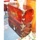 A pair of Oriental hard decorated lacquered cabinets to/w a companion low table (3)