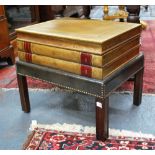 A tooled leather clad occasional table presented as a stack of three oversize 'Chambers Journals',