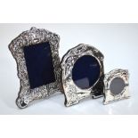Two small modern silver-faced photograph frames in the Art Nouveau manner,