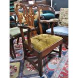 An 18th century country elm and fruitwood armchair,