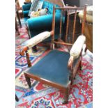 A good quality 19th century hardwood library armchair turned as faux bamboo,