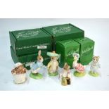 Six Beswick Ware Beatrix Potter models embellished with gold and bearing gold backstamps,