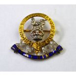 15th Kings Hussars - Diamond and blue enamel set badge brooch, yellow metal set, approx 3.5 x 3.