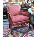 A 19th century Biedermeier style mahogany framed salon armchair with upholstered panels and cushion