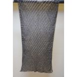 A 1920s black silvered metal Egyptian assuit shawl with geometric design,