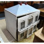 A substantial Georgian style wooden doll's house, double sided comprising nine rooms,