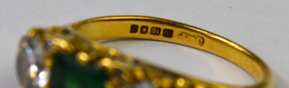 An emerald and diamond three stone ring, 18ct yellow gold carved setting, - Image 3 of 4
